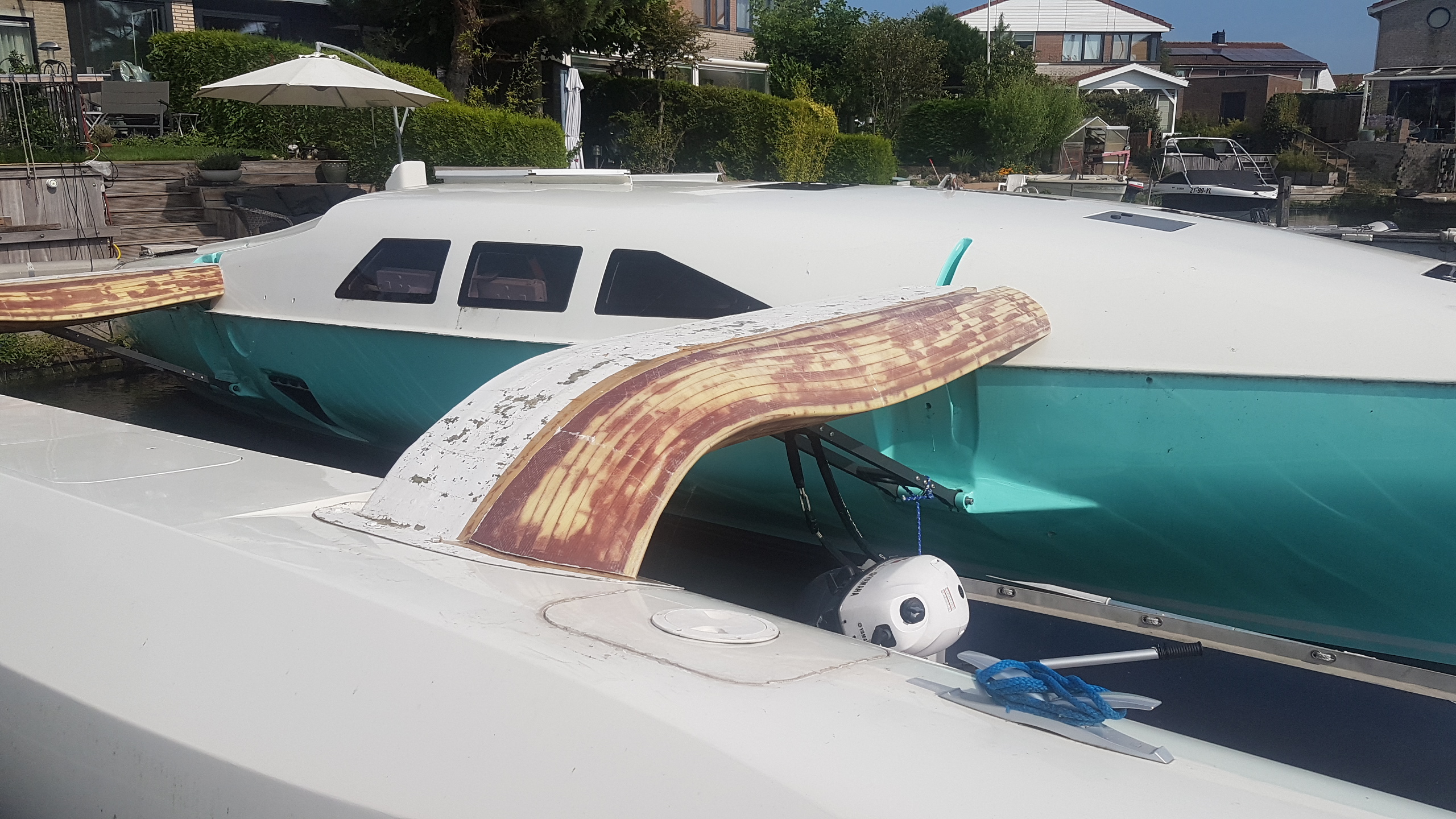 Beam fairings trial fitted on the starboard beams, showing the transition between beam, fairing, and cabin.