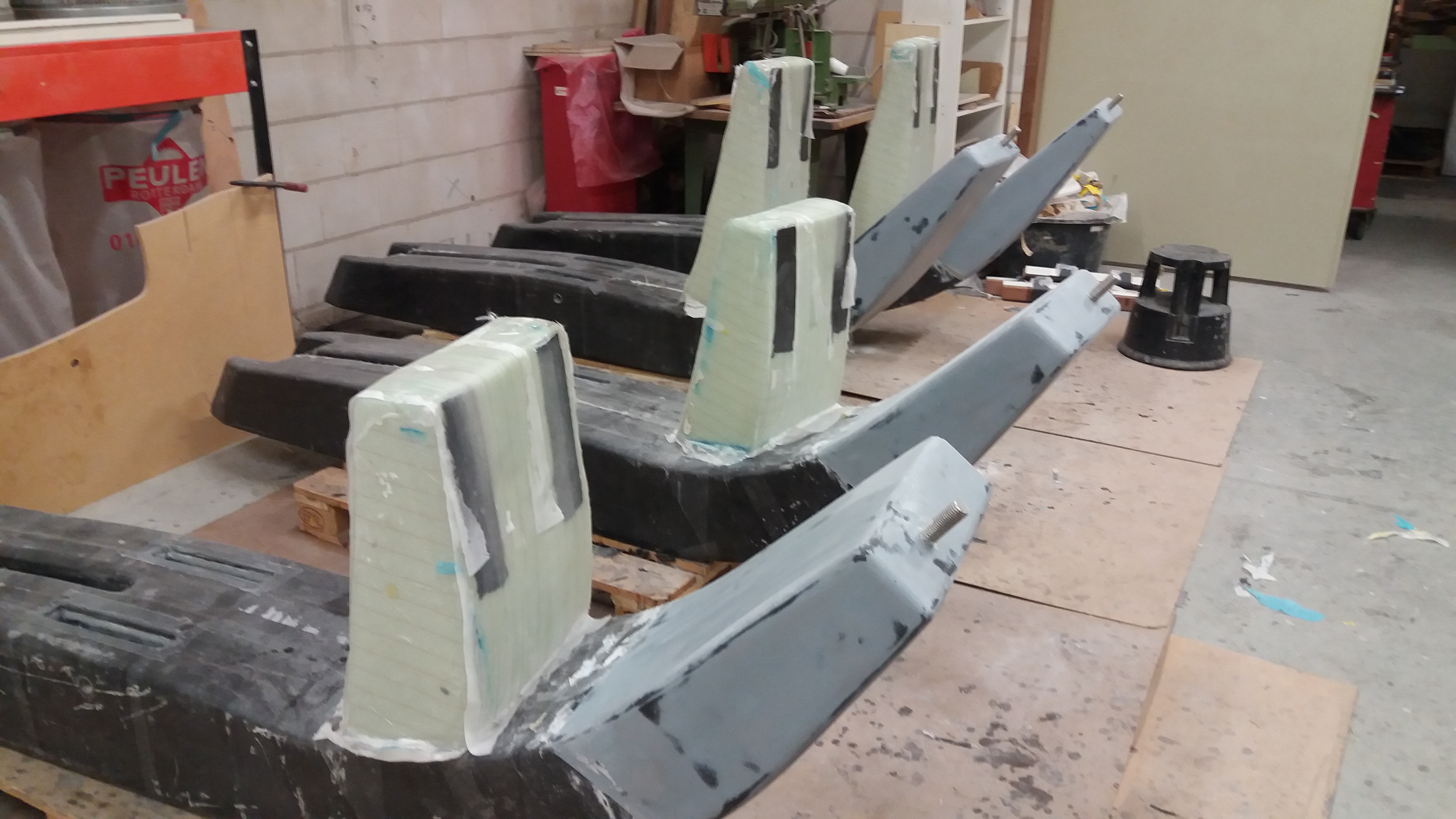 Beam sleeves after removal, ready for final fitting and assembly.