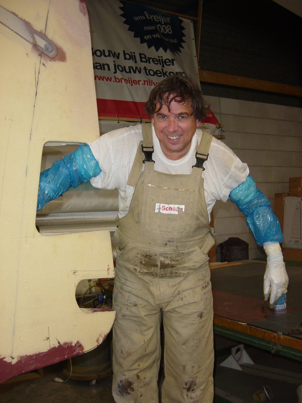 Laminating and installing the bow pole tube with integral carbon forestay chainplate