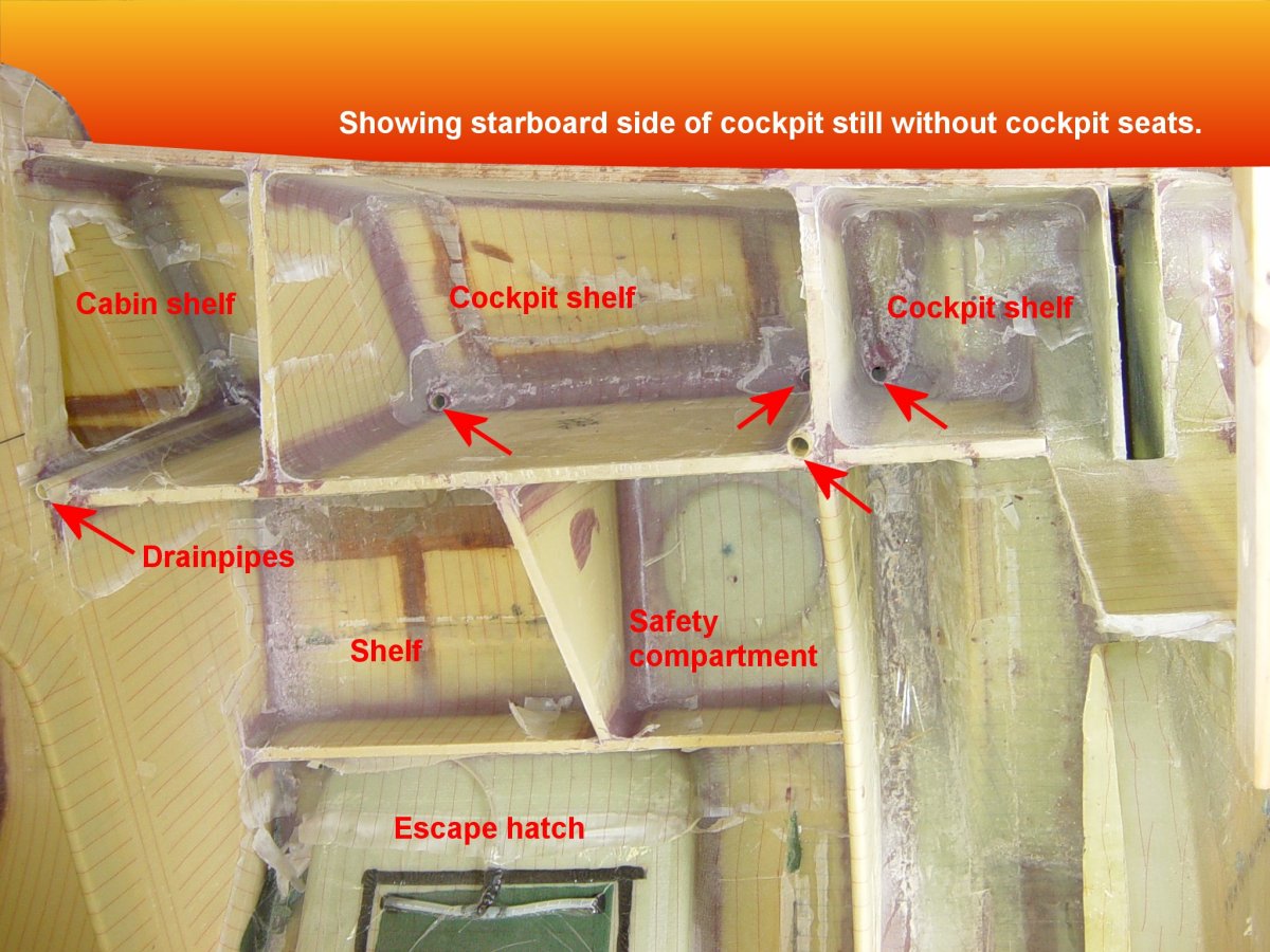 Inside the starboard main hull half with bulkheads installed, cockpit area still without cockpit seats