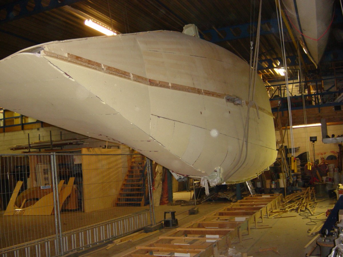 Main hull freed from the mold frames and turned upside down using four electric hoists