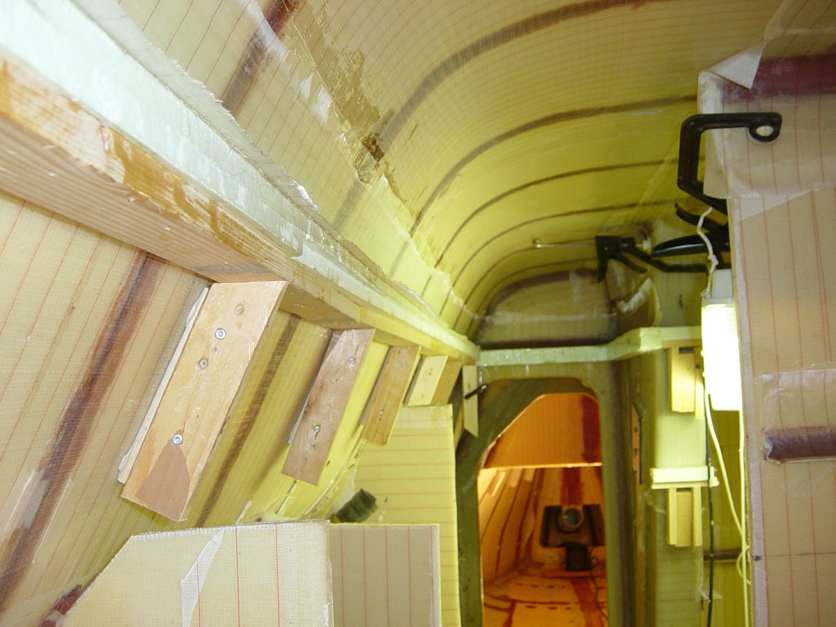 Interior structural fillets and flanges installed while the main hull is upside down